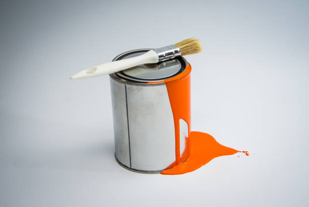 istock Paint tin can with paint brush,orange color 670799462