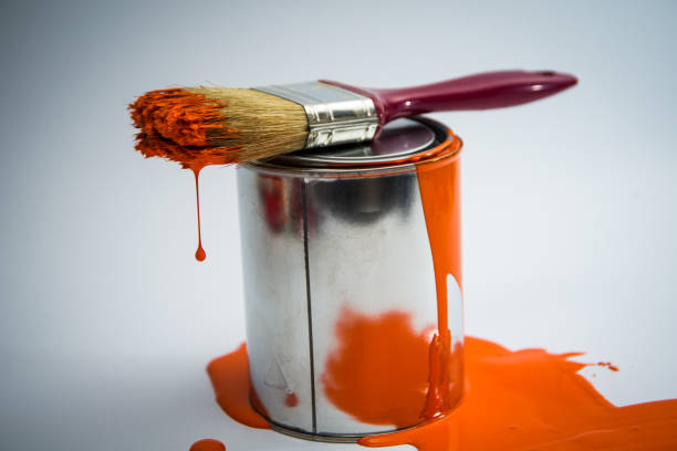 istock Paint tin can with paint brush,orange color 670799800
