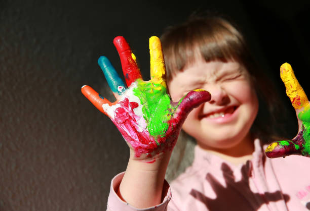 istock Cute little girl with painted hands. 670805666