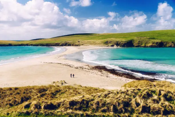 Sandbar, known as a tombolo, connecting St Ninian's Isle with the mainland of the Shetland Islands off the north of Scotland.