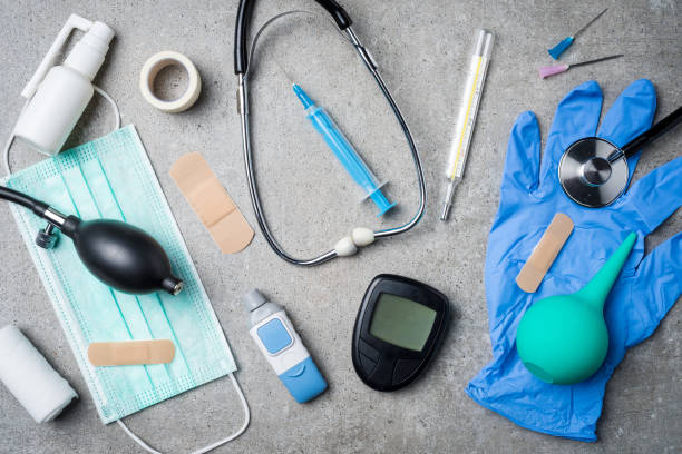 istock Medical equipment on gray stone background. 670810492