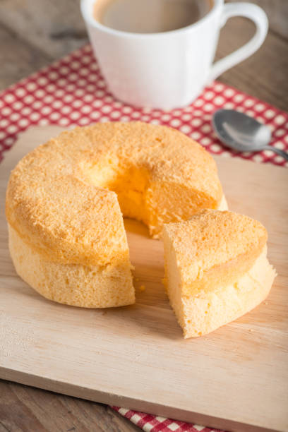 istock Sliced of Chiffon cake with cup coffee. 670811134