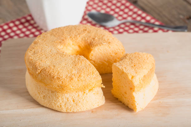 istock Sliced of Chiffon cake on wood board. 670811194