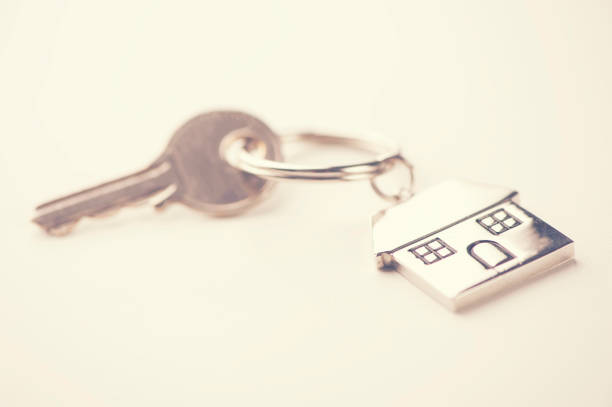 istock house key isolated on white background 670812274