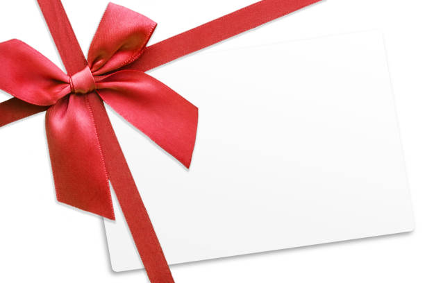 istock Shiny red satin ribbon on white background 670815220