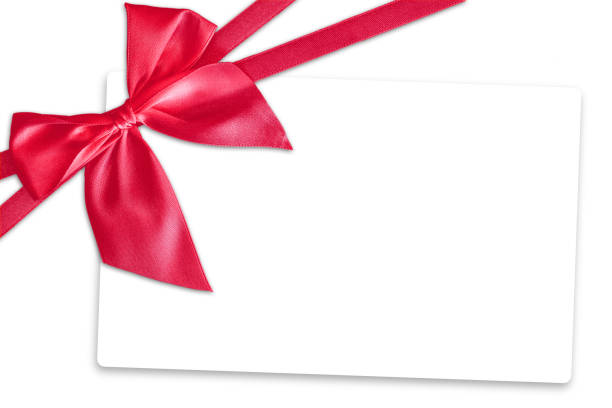 istock Shiny red satin ribbon on white background 670815272