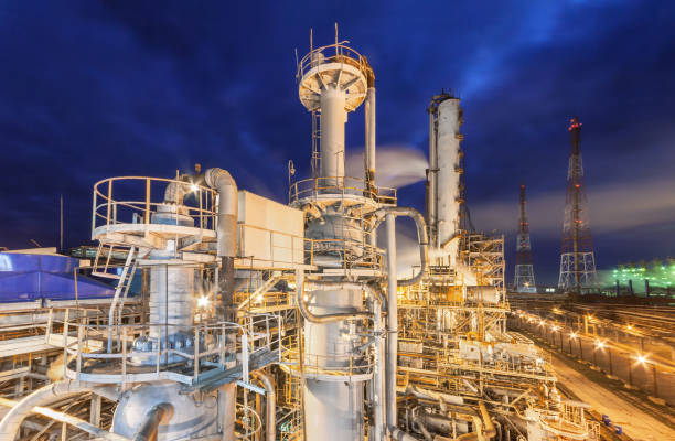 Chemical plant for production of ammonia and nitrogen fertilization Chemical plant for production of ammonia and nitrogen fertilization on night time. ammonia fertilizer stock pictures, royalty-free photos & images
