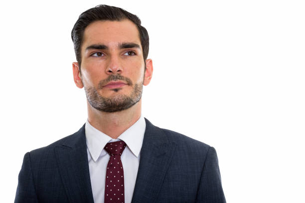 istock Studio shot of young handsome businessman thinking while looking up 670819462