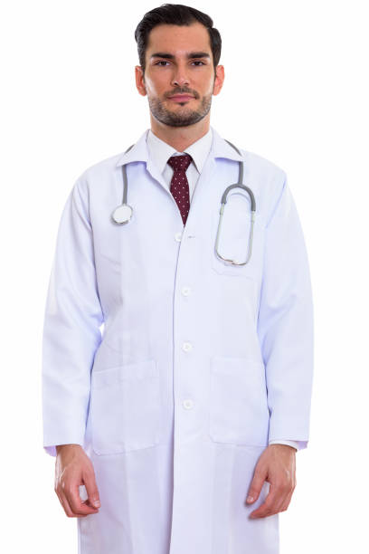 istock Studio shot of young handsome man doctor standing 670819500