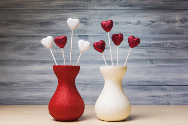 istock Red and white Valentines hearts over wooden background 670822014
