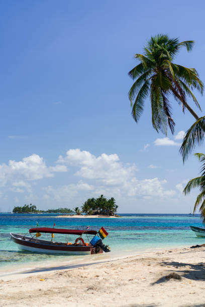 istock Boat on beach on Isla de  Perro island in Caribbean See, Panama 670826062