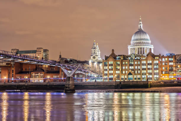 istock St. Paul's Cathedral and Millennium Bridge at Night 670826356