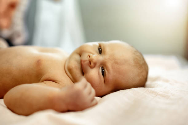istock Adorable newborn baby lying on blanket 670830272