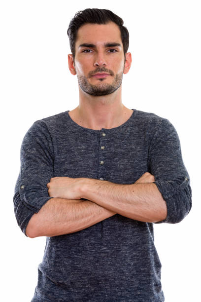 istock Studio shot of young handsome man with arms crossed 670834738