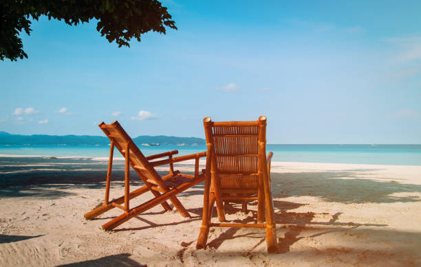 istock chairs on sand beach in Boracay, Philippines 670836138