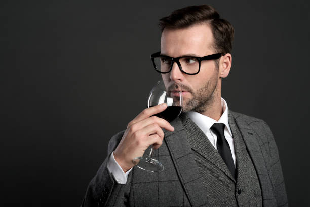 istock Portrait of elegant man drinking wine 670850706