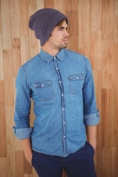 istock Confident hipster wearing knitted hat 670850782