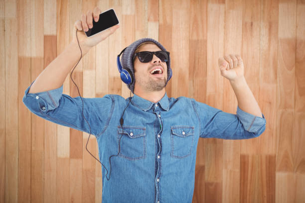 istock Hipster wearing sunglasses enjoying music 670850946