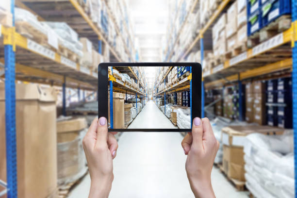istock Warehouse of large factory & digital tablet 670852562