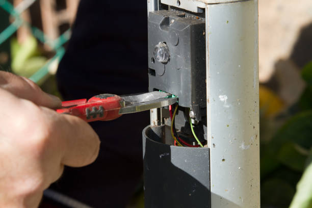 istock electrician at work to fix some aplliances 670857466