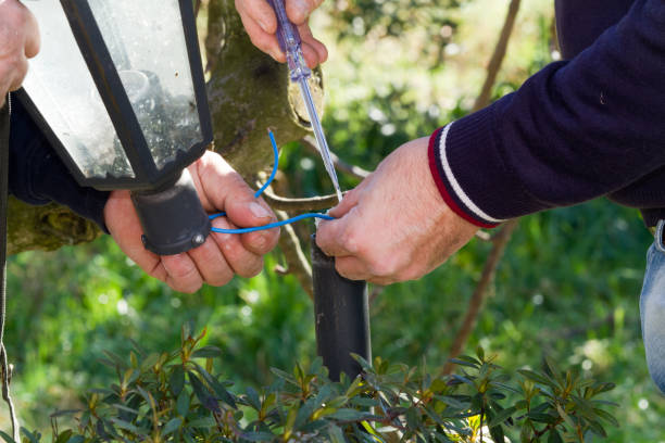 istock electrician at work to fix some aplliances 670858386