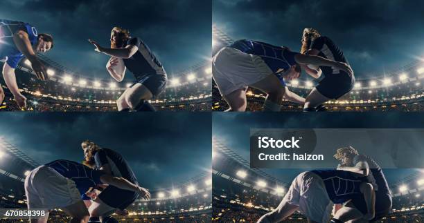 Rugby Player Jumps With A Ball Stock Photo - Download Image Now - Rugby - Sport, Stadium, Rugby Post