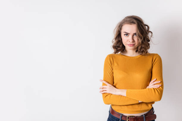 istock Serious Young Woman With Arms Crossed. 670862678