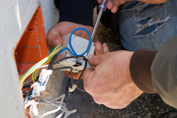 istock electrician at work to fix some aplliances 670862994