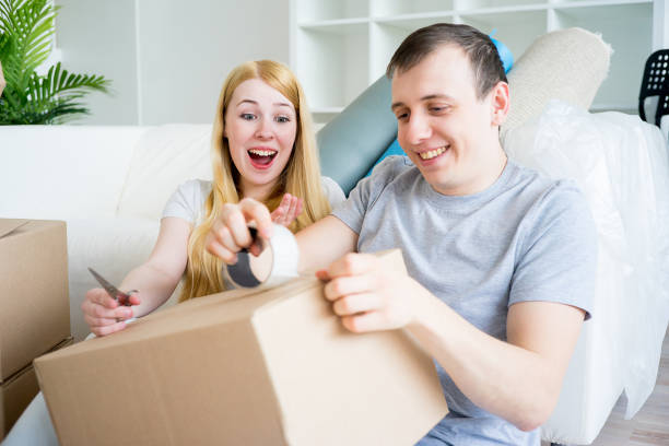 istock Couple moving into new house 670867438