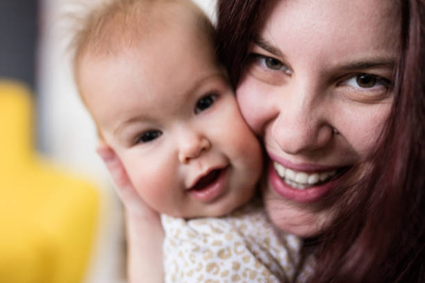 istock Cute and cheerful mother and baby 670870484