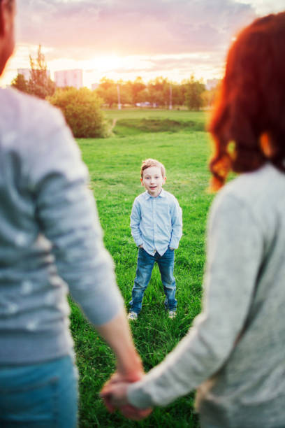 istock Happy family in the park 670870580