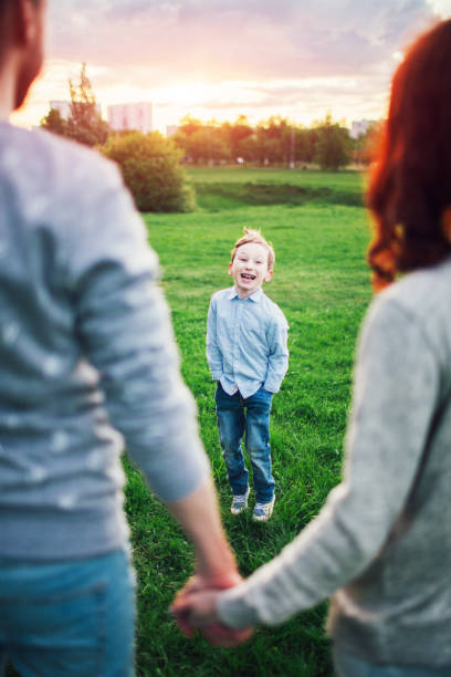 istock Happy family in the park 670870870