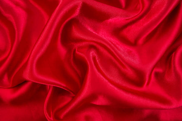 istock Red cloth waves background texture.Red cloth background.Red cloth texture 670871074
