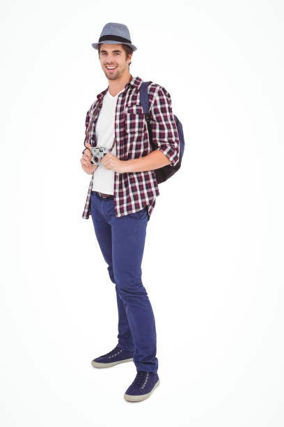 istock Portrait of happy man holding camera 670875128