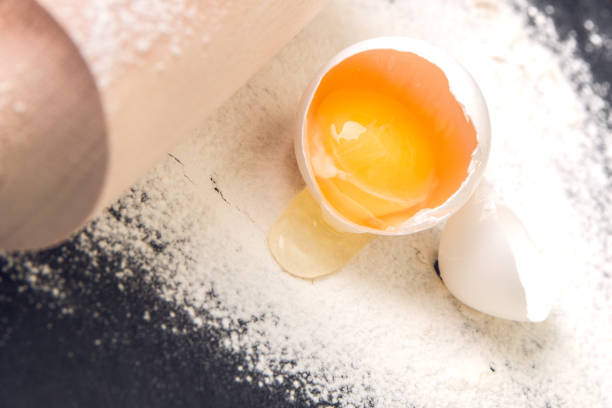 istock Ingredients and tools for baking. Close up. Egg, flour and rolling pin. 670878050