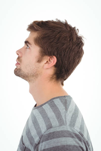 istock Side view of serious man looking up 670879720