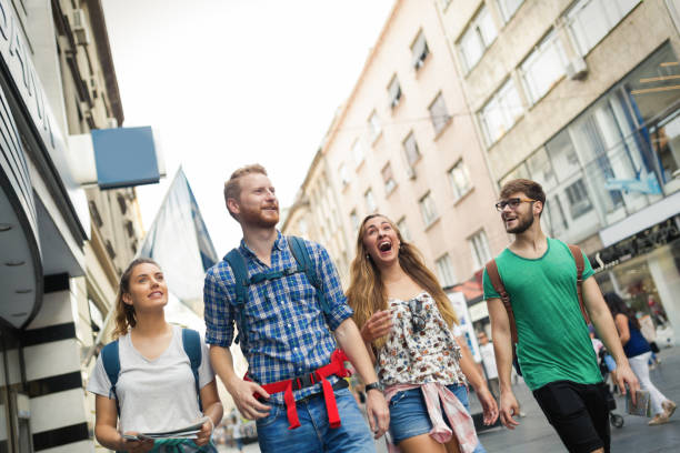istock Happy young people having fun outdoors and smiling 670879970