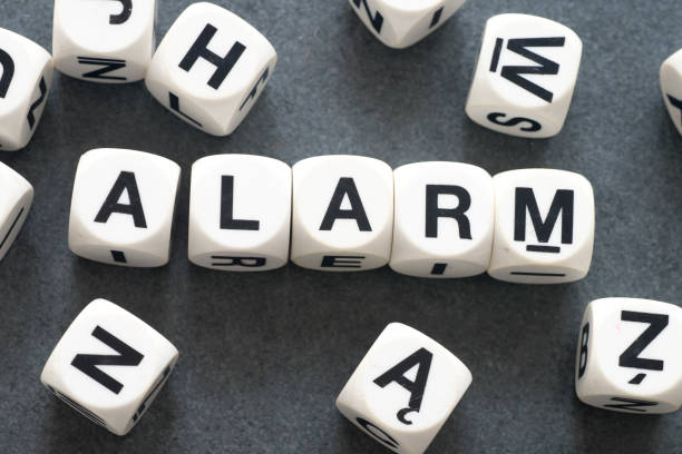 istock word alarm on toy cubes 670880212