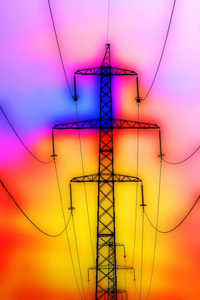 istock Power line pylons against colorful background 670880350