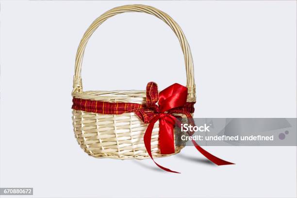 Beautiful Wicker Basket With Red Bow Isolated On White Background Stock Photo - Download Image Now