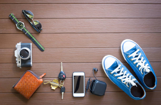 Travel accessories on wooden background