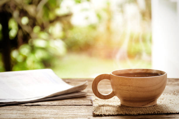 istock Morning coffee and new paper 670884022
