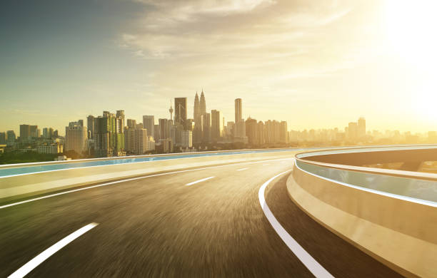 istock Highway overpass modern city skyline background . Evening scene . 670887188