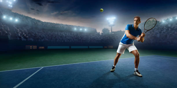 istock Tennis: Male sportsman in action 670891404