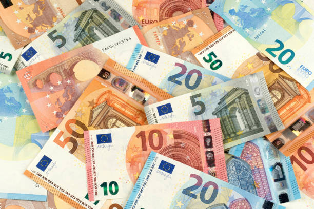 euro bank note currency finance background many euro bank note currency finance background european union currency stock pictures, royalty-free photos & images