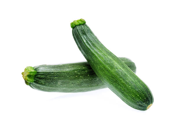 istock Fresh zucchini isolated on a white background 670892722