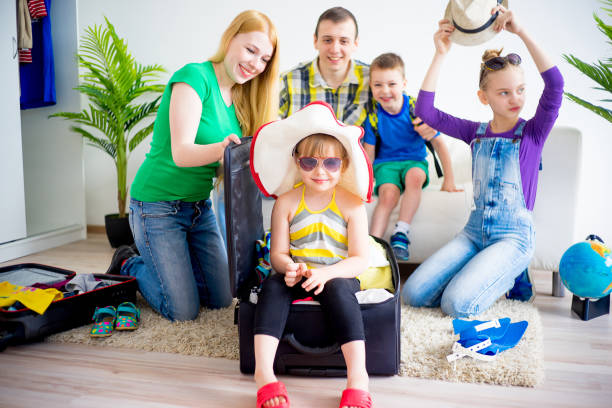 istock Family packing suitcases 670900818