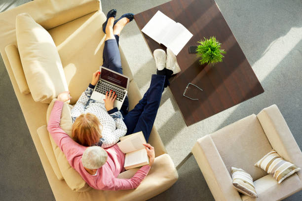 istock Senior couple relaxing together 670901304