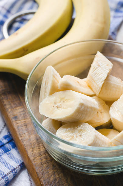 istock Sliced fresh banana in a glass bowl. 670901864