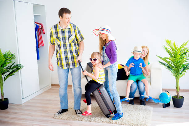 istock Family packing suitcases 670908938
